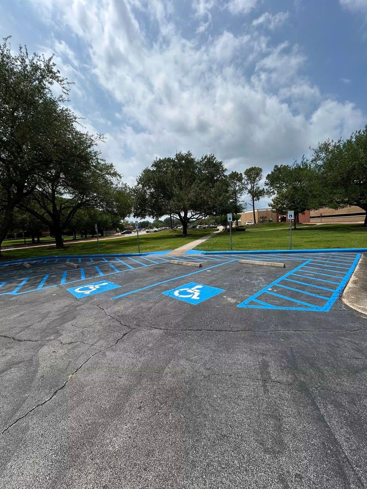 Blue ADA-compliant accessible parking striping